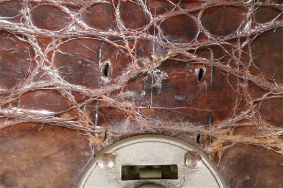An early 20th century crocodile skin briefcase and a suitcase length 49cm